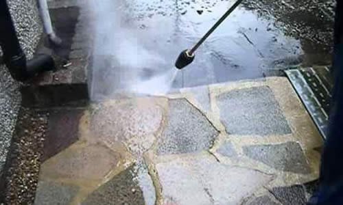 Starwash Professional Lake County IL pressure washing your stones to make your path presentable.